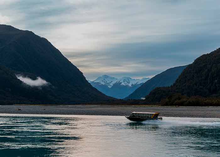 The Haast River Safari jet boat on the river