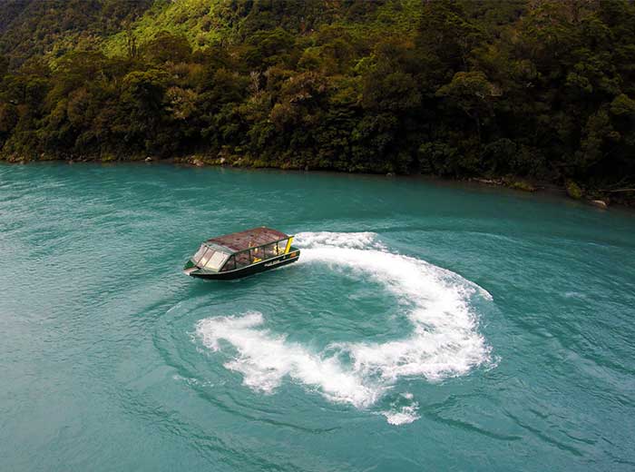 Haast River Safari boat doing a spin